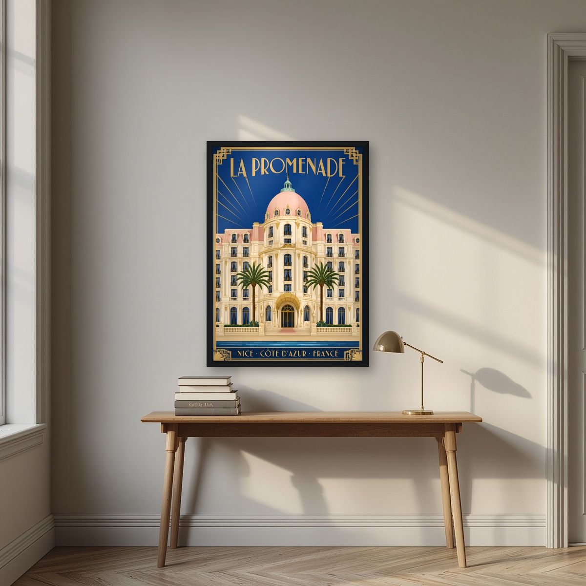 La Promenade — Nice art print, in a black frame, styled in a desk