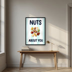 Nuts About You – Amalfi Aqua in a black frame, above an oak writing desk
