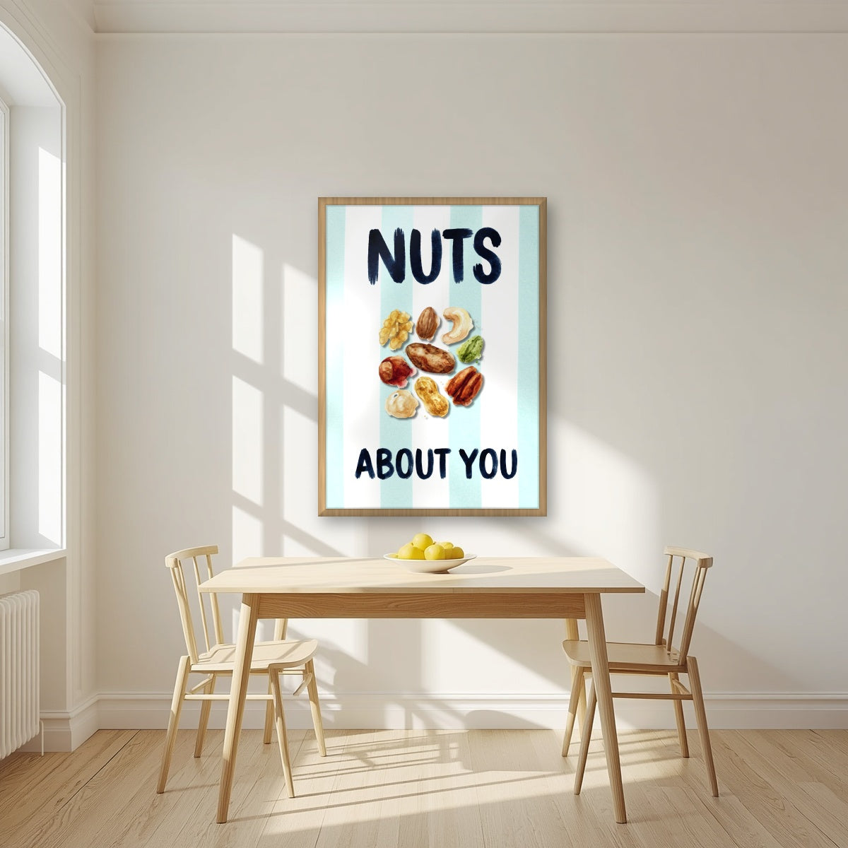 Nuts About You – Amalfi Aqua in an oak frame, above a dining table in a bright kitchen