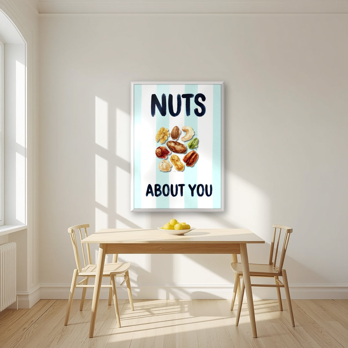Nuts About You – Amalfi Aqua in a white frame, above a dining table in a bright kitchen