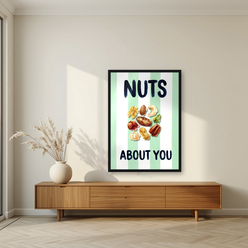 Nuts About You – Cabana Green in a black frame, above a walnut sideboard in a living room