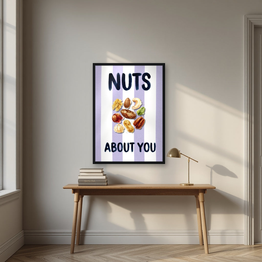 Nuts About You – Capri Violet in a black frame, above an oak writing desk