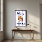 Nuts About You – Capri Violet in a black frame, above an oak writing desk