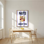 Nuts About You – Capri Violet in an oak frame, above a dining table in a bright kitchen