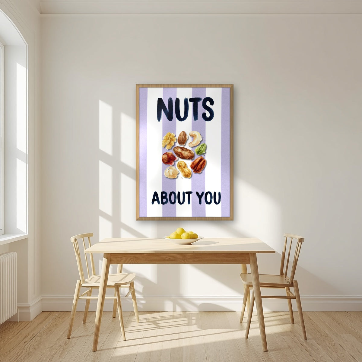 Nuts About You – Capri Violet in an oak frame, above a dining table in a bright kitchen