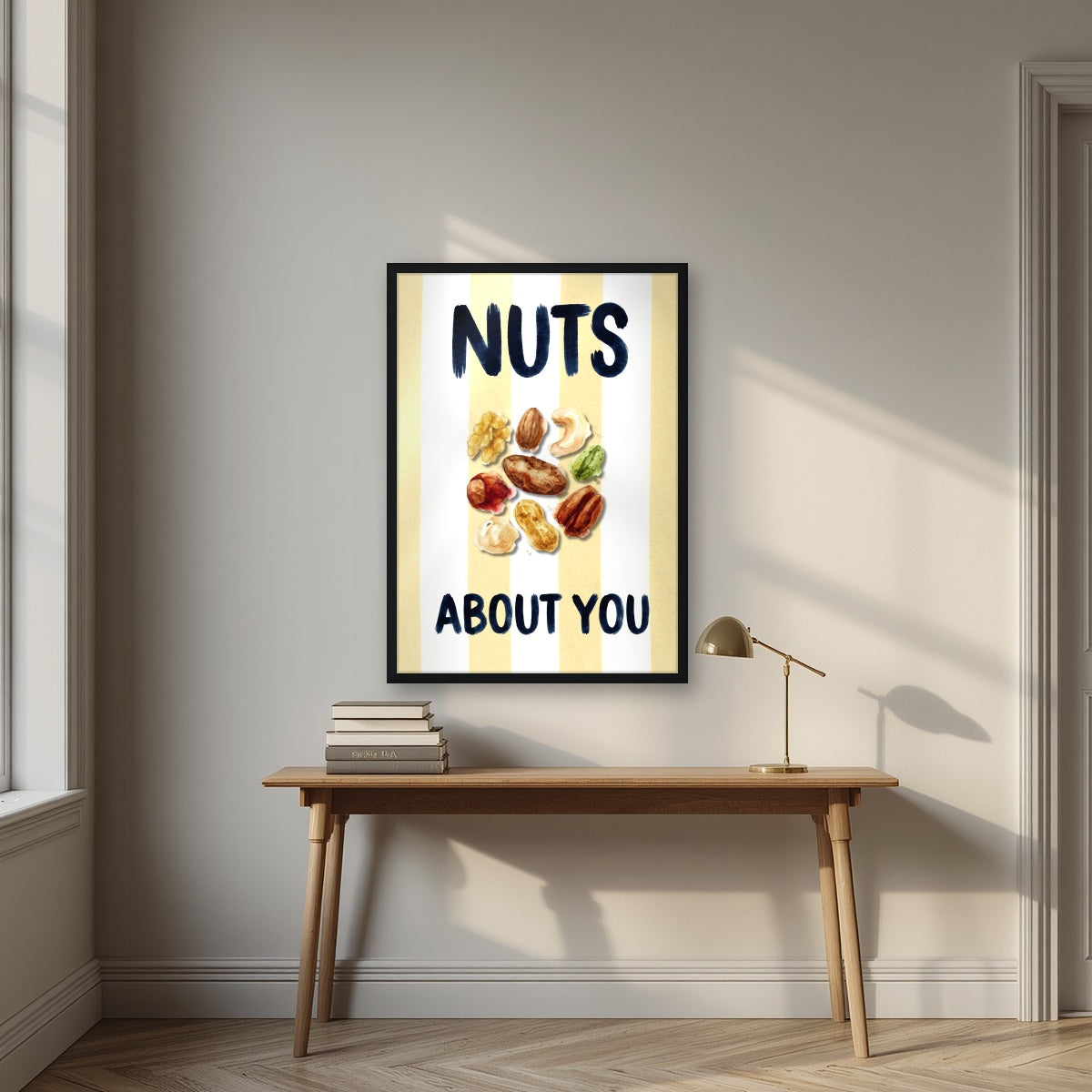 Nuts About You – Limoncello in a black frame, above an oak writing desk