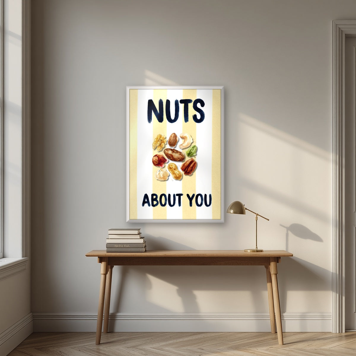 Nuts About You – Limoncello in a white frame, above an oak writing desk