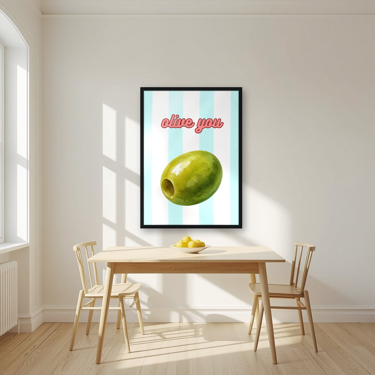 Olive You – Amalfi Aqua in a black frame, above a dining table in a bright kitchen