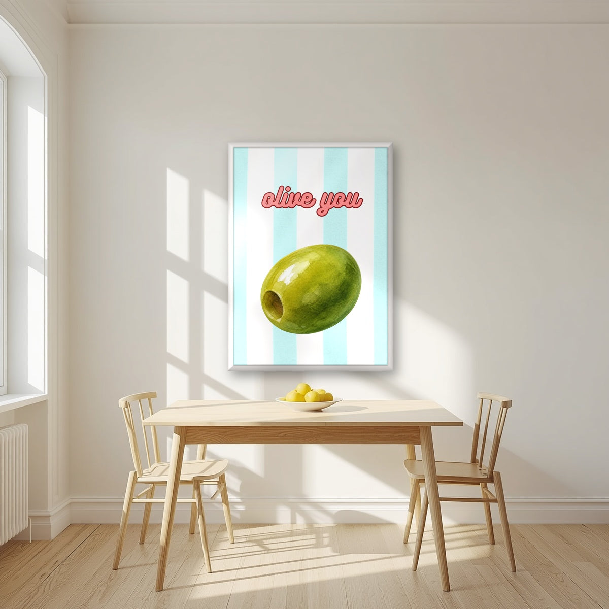 Olive You – Amalfi Aqua in a white frame, above a dining table in a bright kitchen