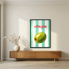 Olive You – Cabana Green in a black frame, above a walnut sideboard in a living room