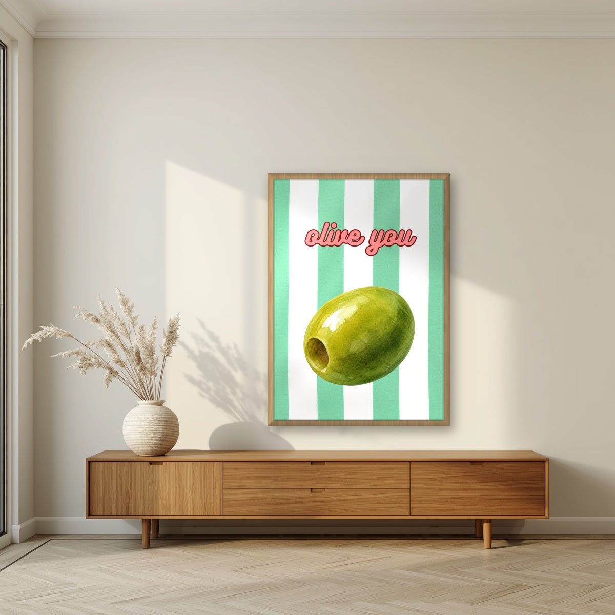 Olive You – Cabana Green in an oak frame, above a walnut sideboard in a living room