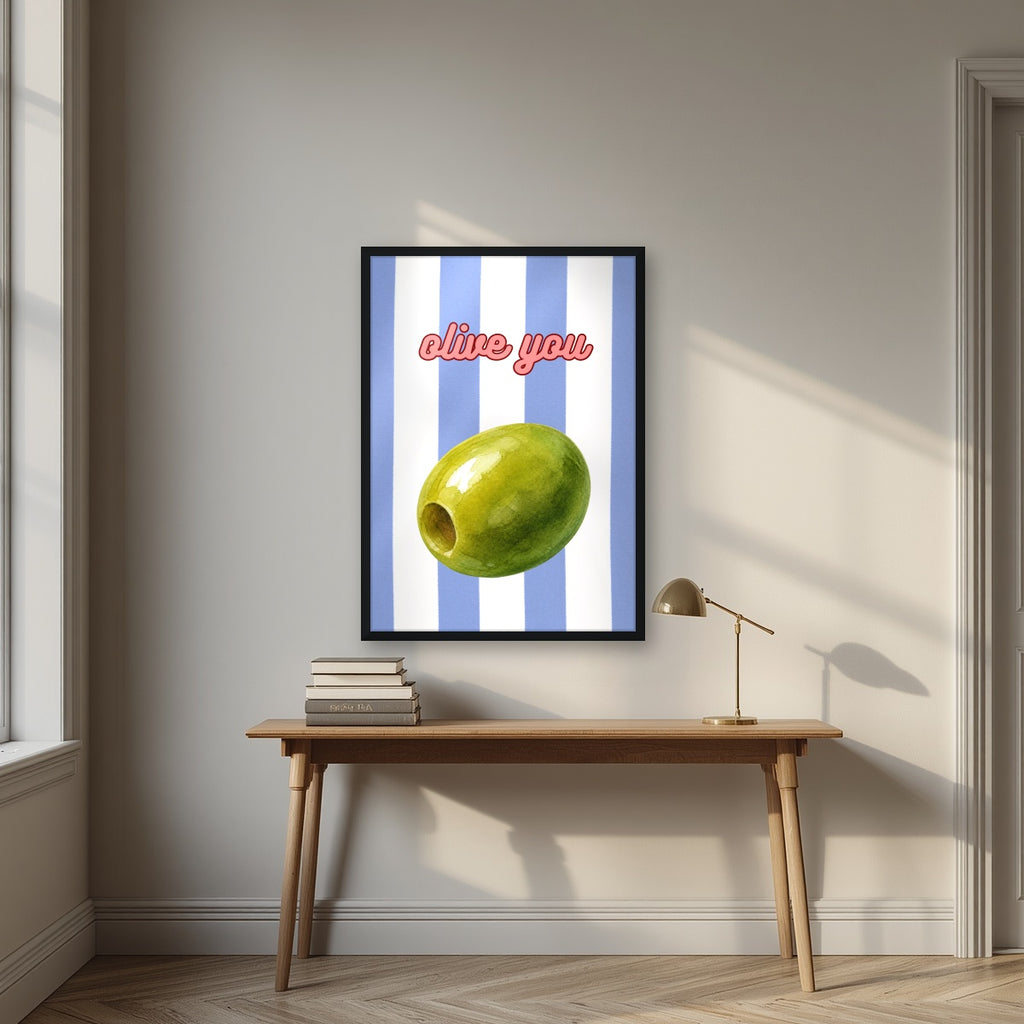 Olive You – Capri Violet in a black frame, above an oak writing desk