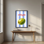 Olive You – Capri Violet in a black frame, above an oak writing desk