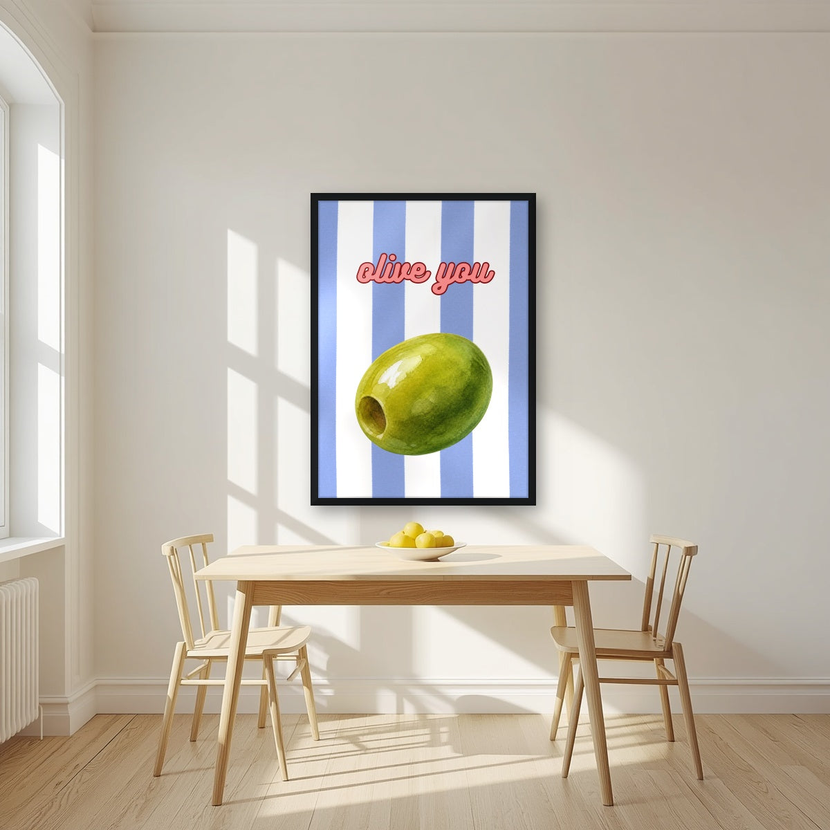 Olive You – Capri Violet in a black frame, above a dining table in a bright kitchen