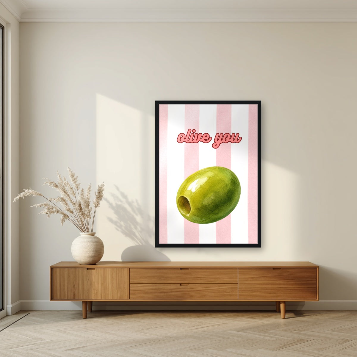 Olive You – Positano Pink in a black frame, above a walnut sideboard in a living room