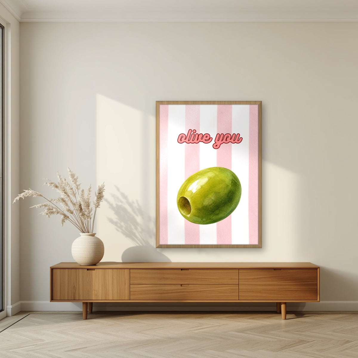 Olive You – Positano Pink in an oak frame, above a walnut sideboard in a living room