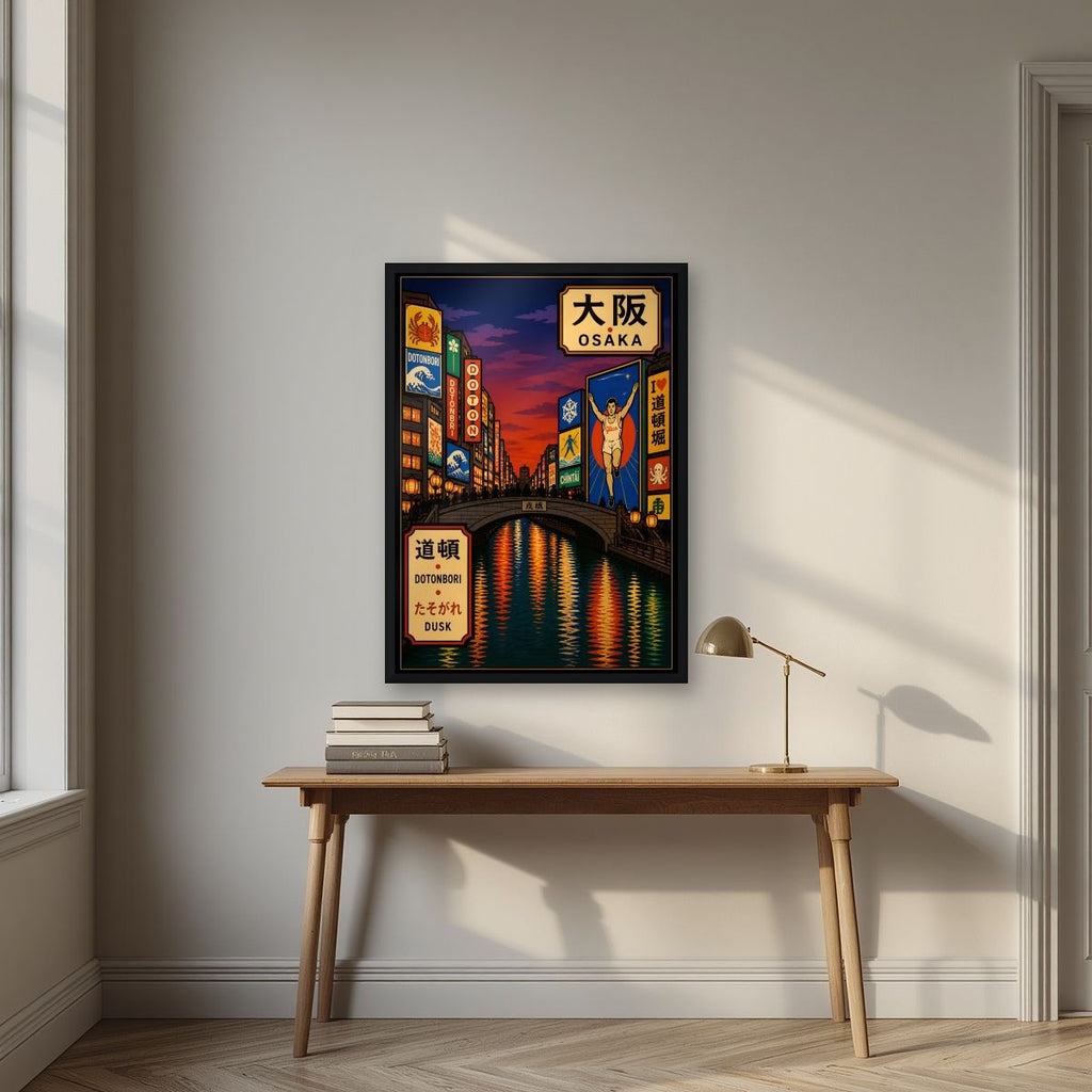 Dotonbori Dusk — Osaka art print, in a black frame, styled in a desk