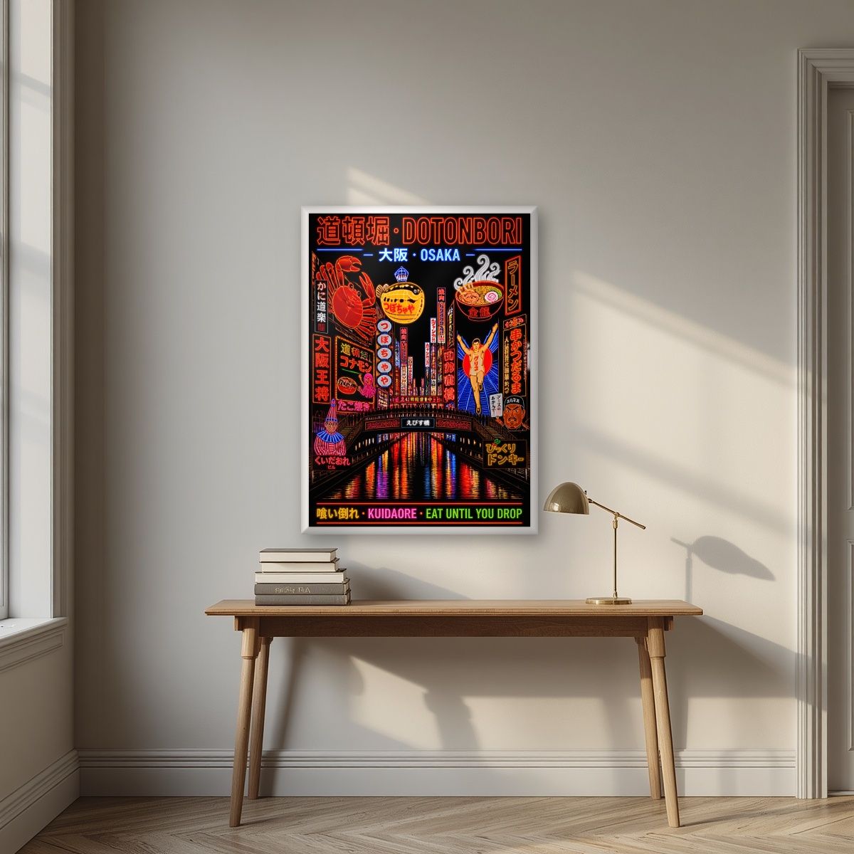 Kuidaore — Osaka art print, in a white frame, styled in a desk