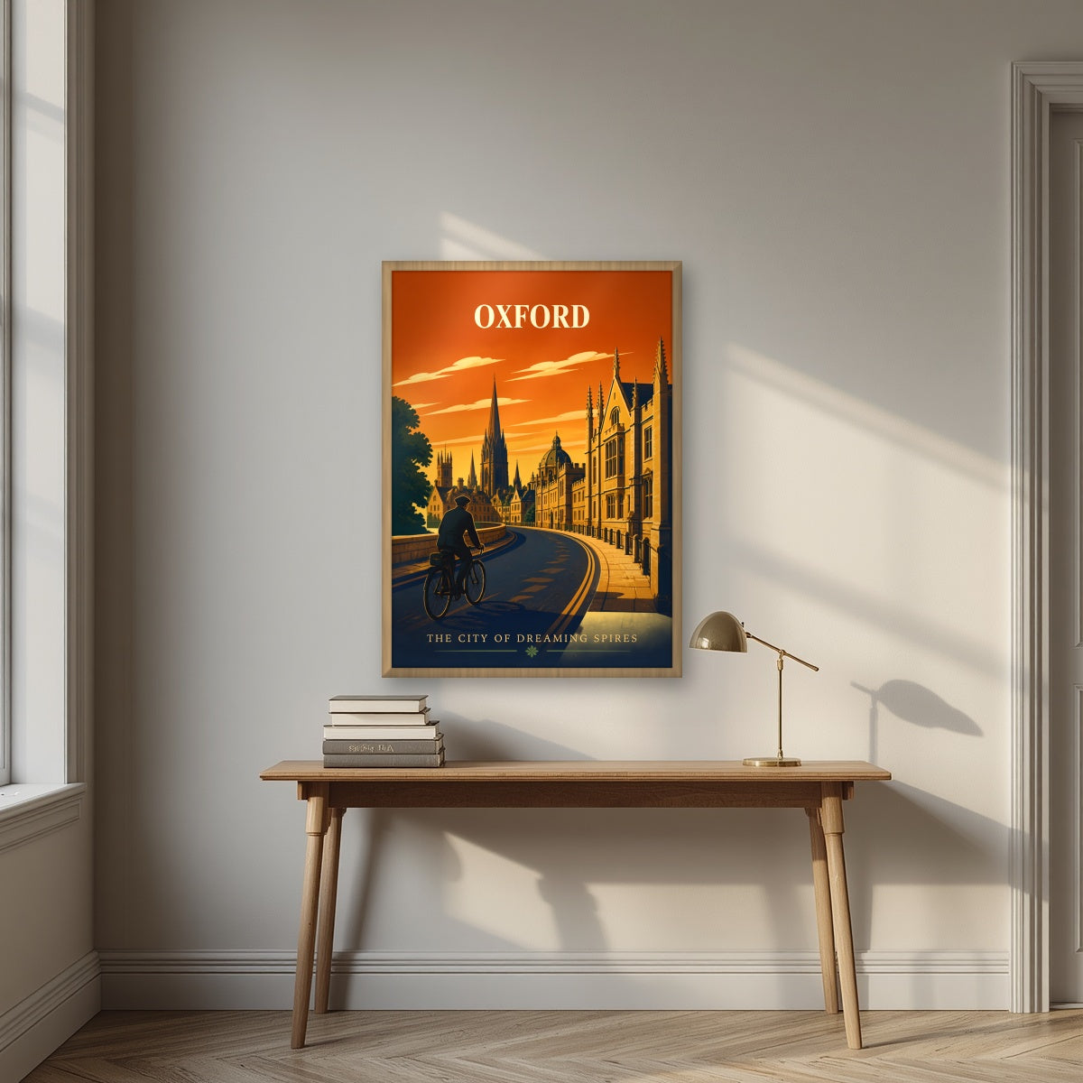 Oxford Dreaming Spires in an oak frame, above an oak writing desk