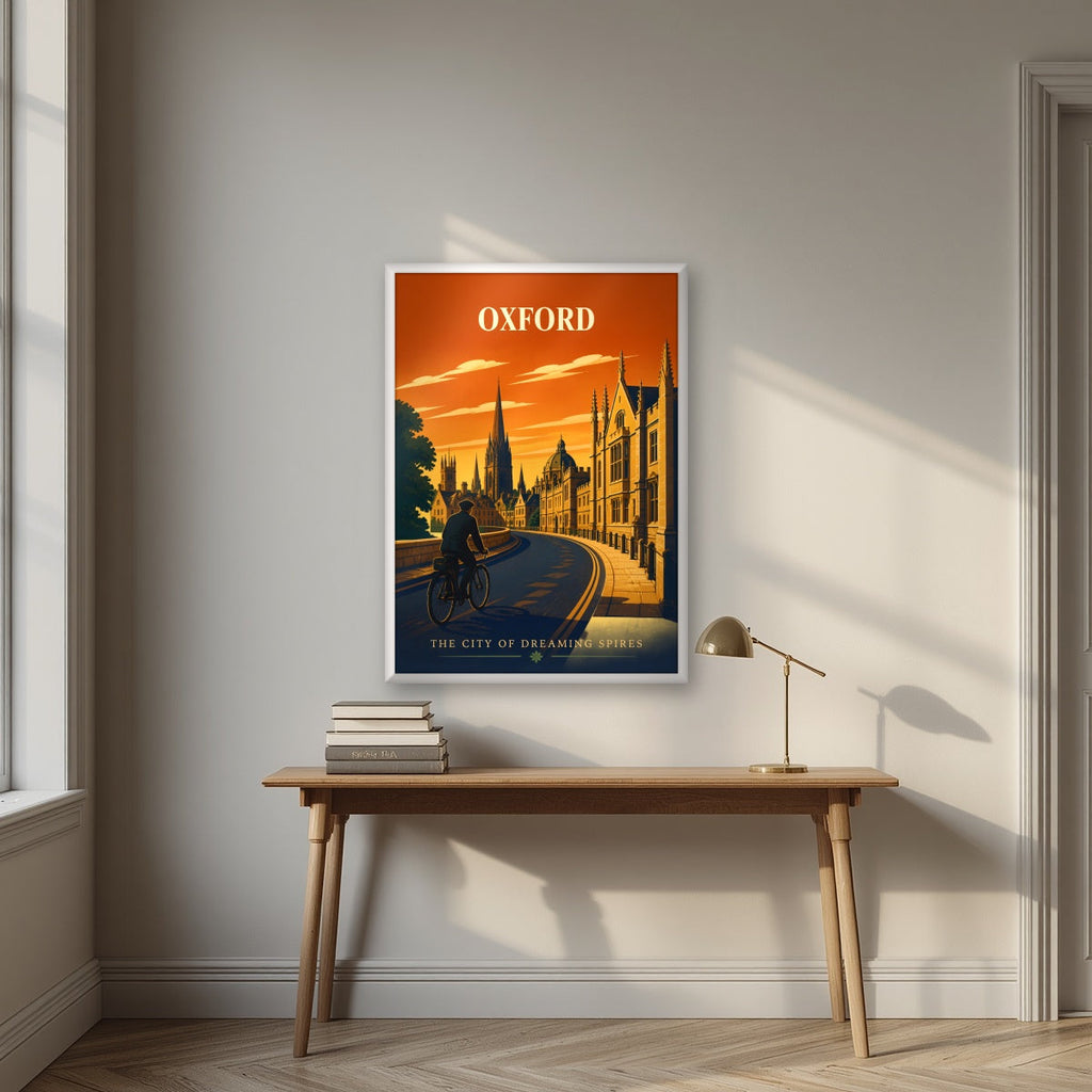 Oxford Dreaming Spires in a white frame, above an oak writing desk