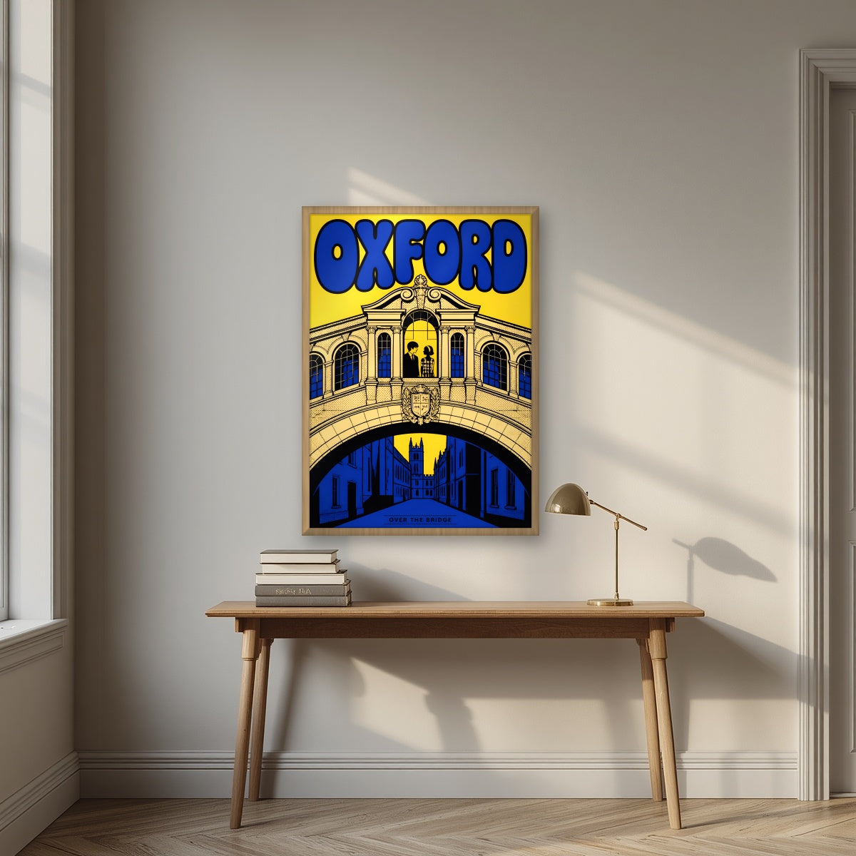 Oxford, Over the Bridge in an oak frame, above an oak writing desk