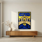 Oxford, Over the Bridge in a black frame, above a walnut sideboard in a living room