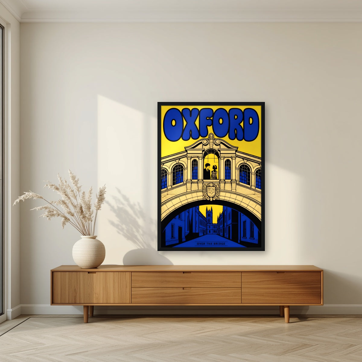 Oxford, Over the Bridge in a black frame, above a walnut sideboard in a living room