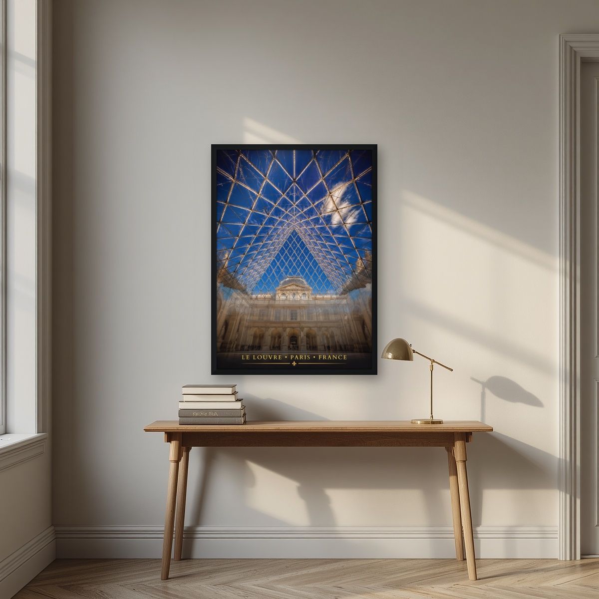 Le Louvre — Paris art print, in a black frame, styled in a desk