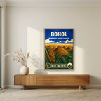 Tarsier Vista — Bohol art print, in an oak frame, styled in a living room