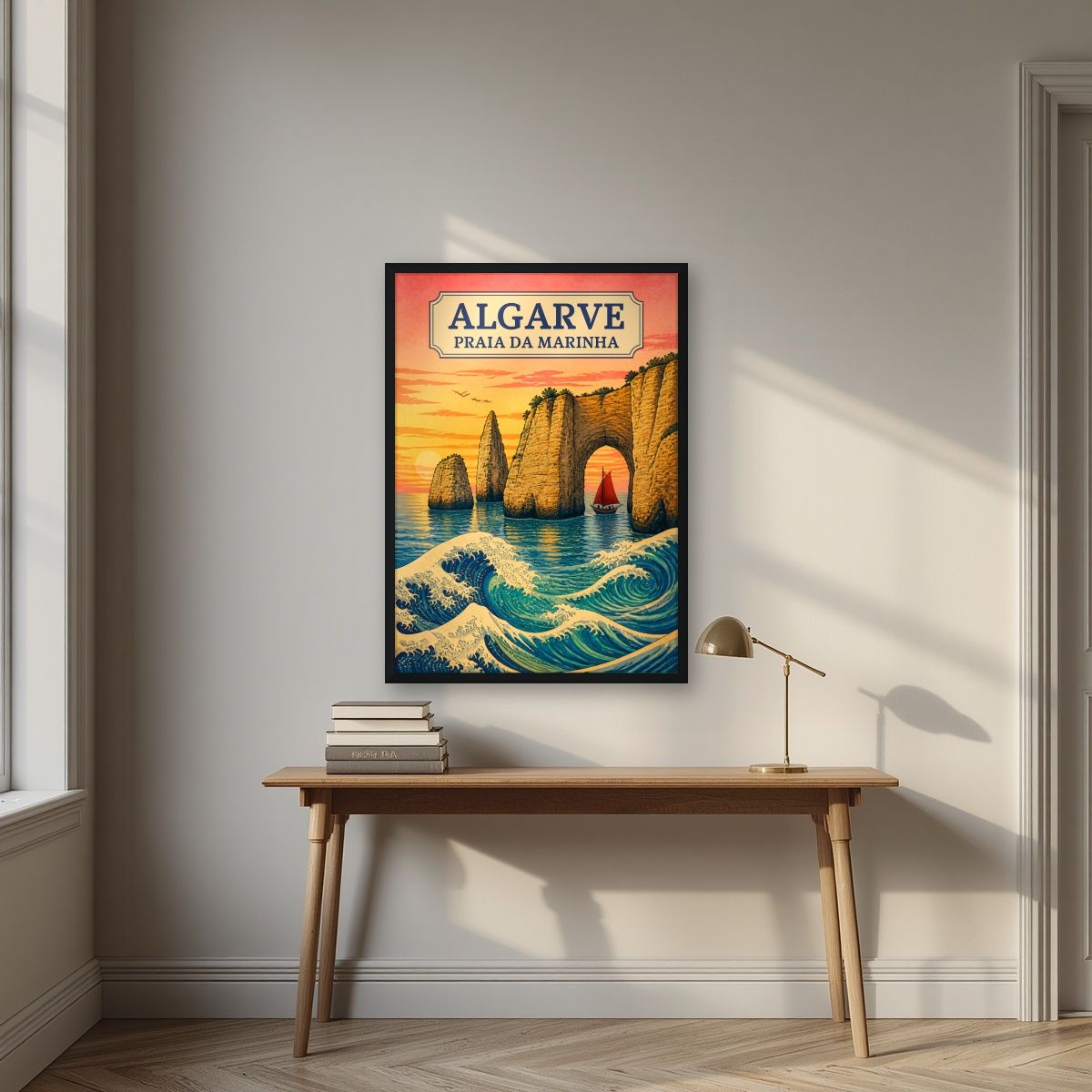 Praia da Marinha — Algarve art print, in a black frame, styled in a desk