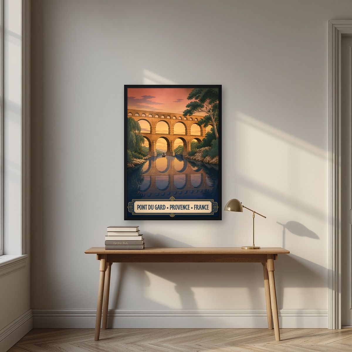 Pont du Gard — Provence art print, in a black frame, styled in a desk