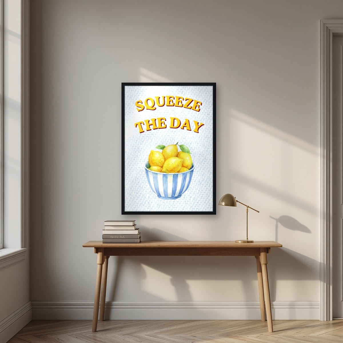 Squeeze The Day – Amalfi Aqua in a black frame, above an oak writing desk