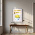 Squeeze The Day – Tuscan Taupe on a thick-edge canvas, above an oak writing desk