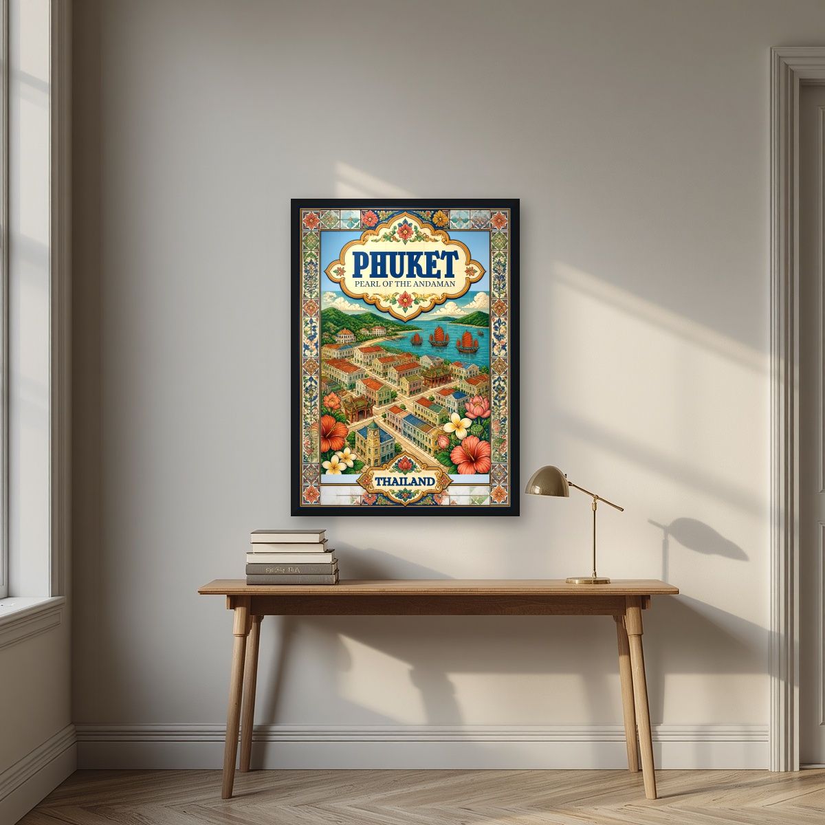 Khai Muk — Phuket art print, in a black frame, styled in a desk