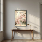 Sakura — Tokyo art print, in a black frame, styled in a desk