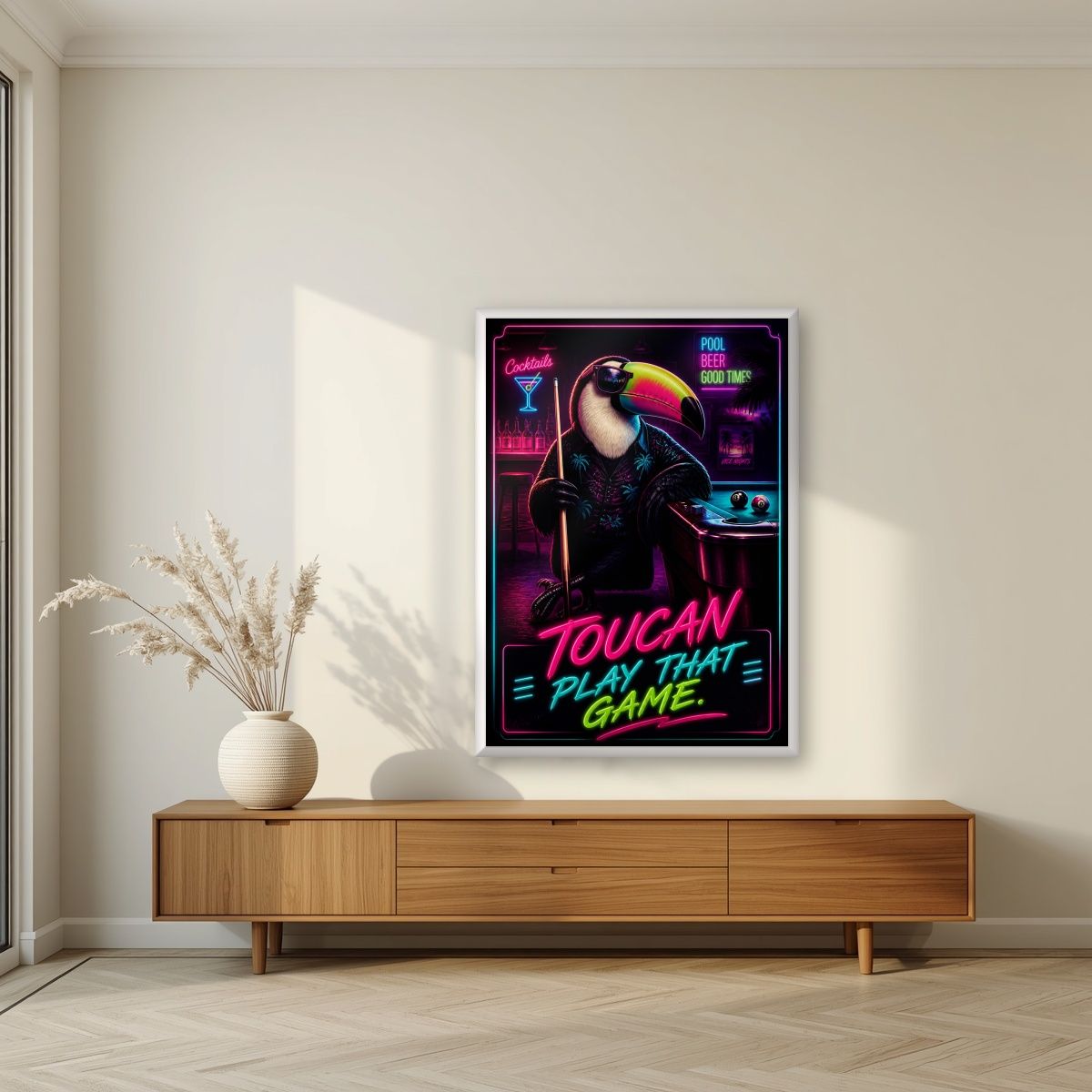 Cue the Neon — Toucan Play That Game art print, in a white frame, styled in a living room