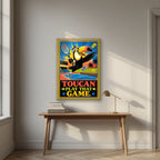Match Point — Toucan Play That Game art print, in an oak frame, styled in a desk
