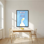 What The Duck – Deckchair Blue art print in a black frame, styled in a kitchen