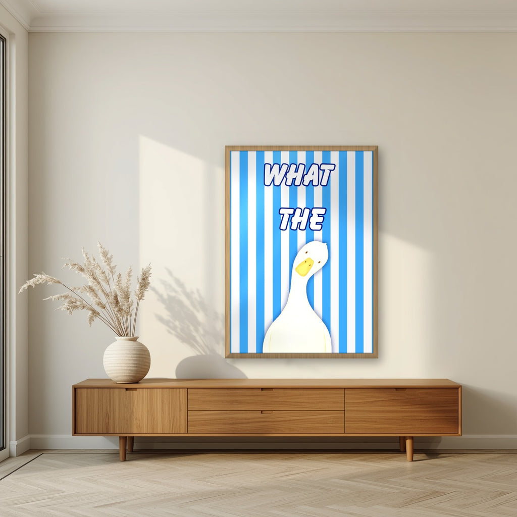 What The Duck – Deckchair Blue art print in an oak frame, styled in a living room