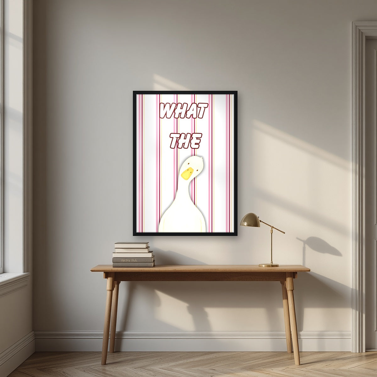 What The Duck – Rosewater Stripe art print in a black frame, styled above a desk