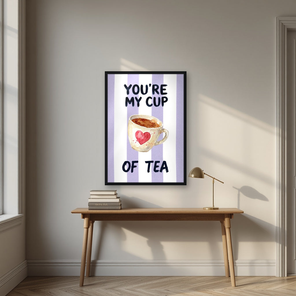 You're My Cup of Tea – Capri Violet in a black frame, above an oak writing desk