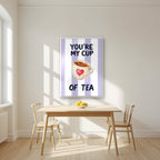 You're My Cup of Tea – Capri Violet in a white frame, above a dining table in a bright kitchen