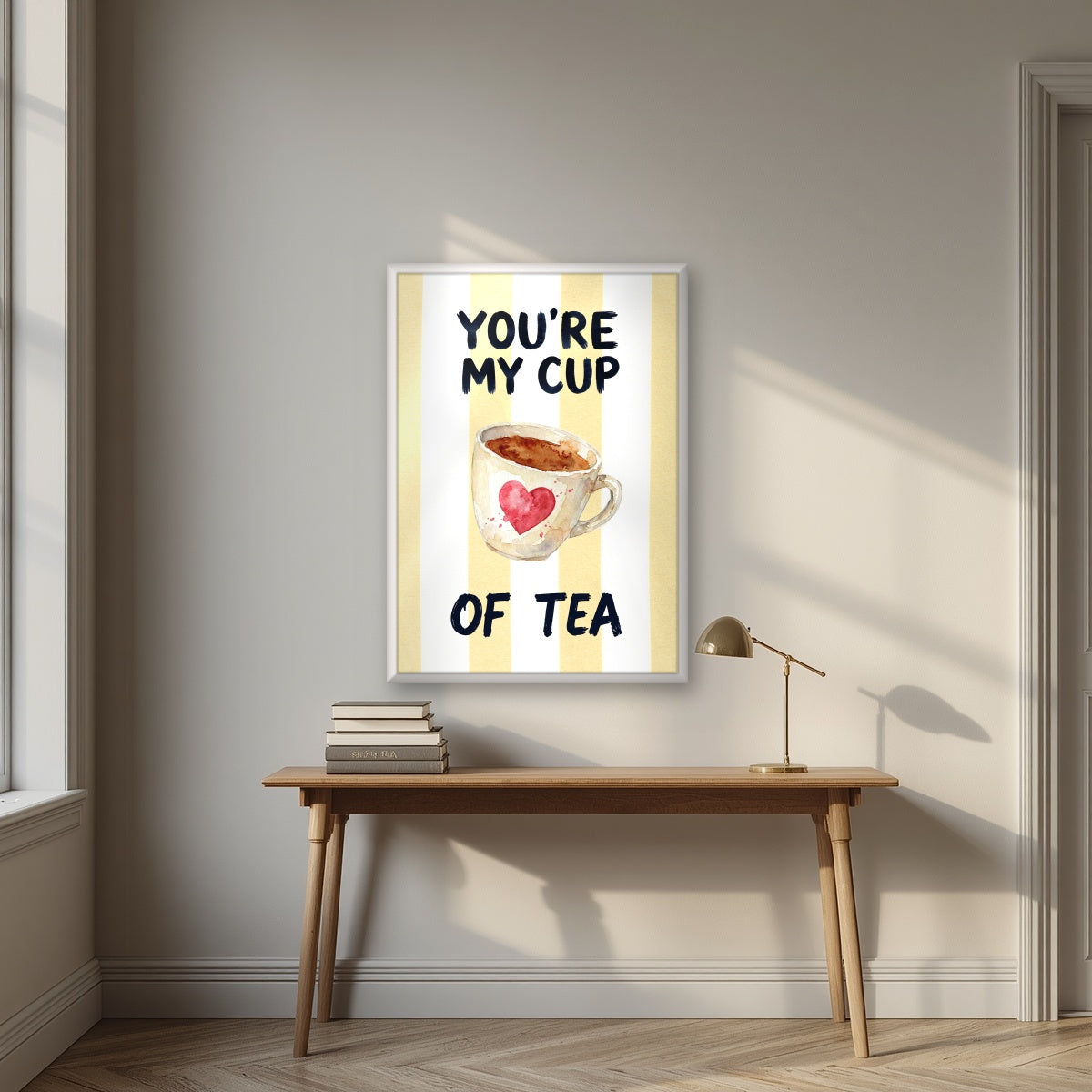 You're My Cup of Tea – Limoncello in a white frame, above an oak writing desk