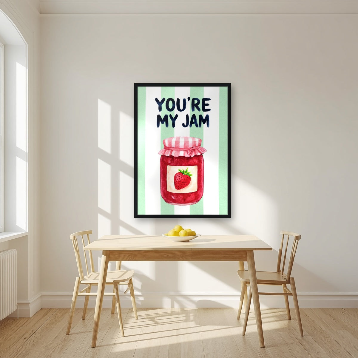 You're My Jam – Cabana Green in a black frame, above a dining table in a bright kitchen