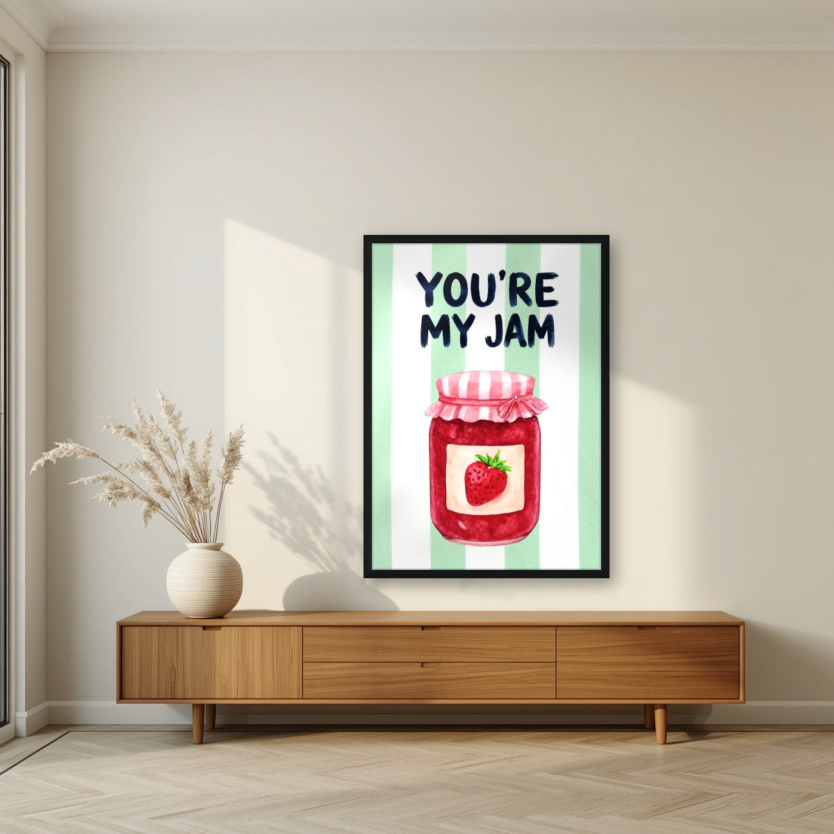 You're My Jam – Cabana Green in a black frame, above a walnut sideboard in a living room