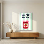 You're My Jam – Cabana Green in a white frame, above a walnut sideboard in a living room