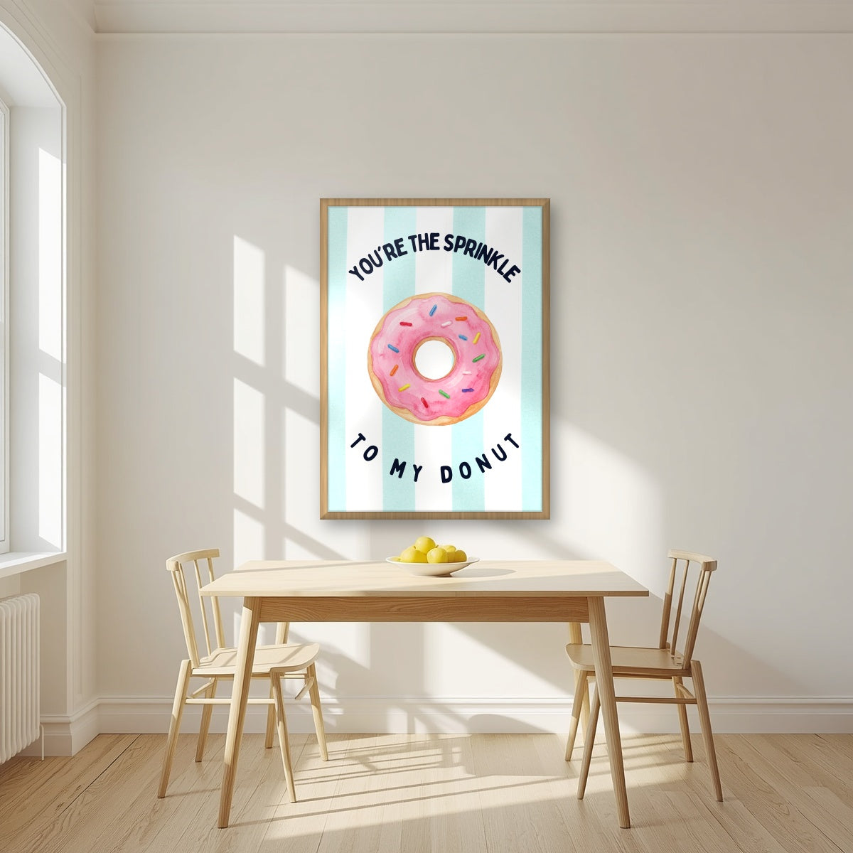 You're the Sprinkle to My Donut – Amalfi Aqua in an oak frame, above a dining table in a bright kitchen