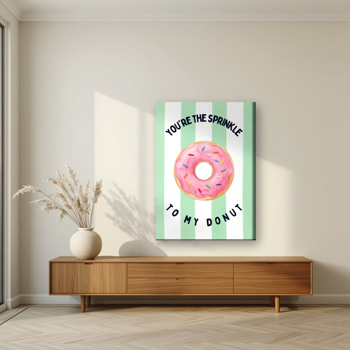 You're the Sprinkle to My Donut – Cabana Green on a slim-edge canvas, above a walnut sideboard in a living room