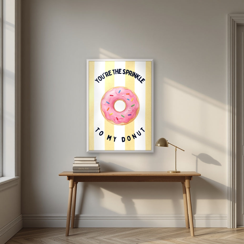 You're the Sprinkle to My Donut – Limoncello in a white frame, above an oak writing desk
