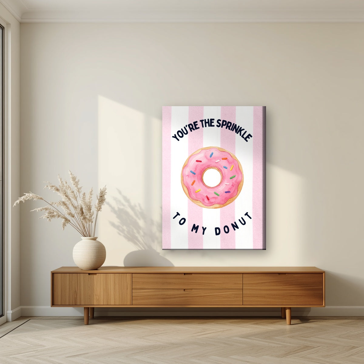 You're the Sprinkle to My Donut – Positano Pink on a slim-edge canvas, above a walnut sideboard in a living room